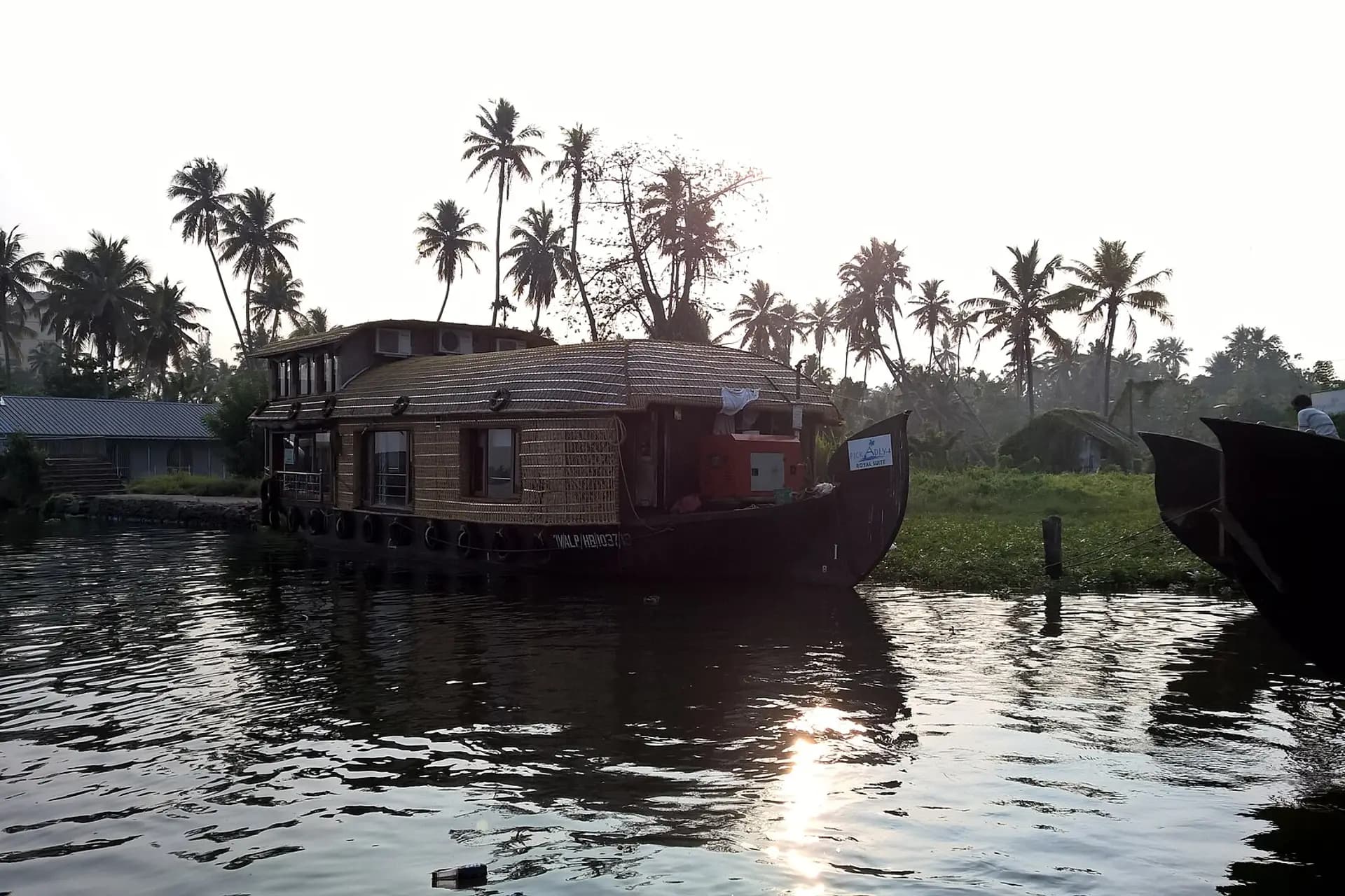 Traditional houseboat cruising the Alleppey backwaters, Kerala